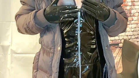 Gloved hand gives rough handjob in PVC raincoat and puffer jacket