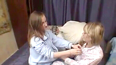 Adorable teen lesbians having fun on the couch part 2