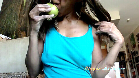 Fiery redhead explores her wetness with her creamy fingers, a pear gag, a pair, and a sweet treat