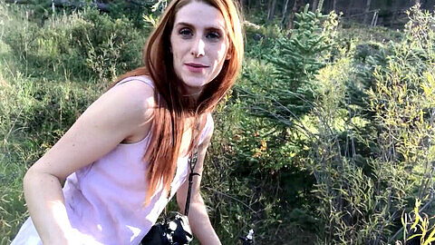 Freckled beauty freckledRED pleasures her pussy with a dildo on a hiking trail, behind the scenes and in public.
