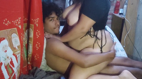 Horny Latina with big tits fucks a youngster