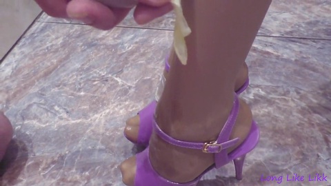 Sensual foot play in purple stockings leads to explosive climax
