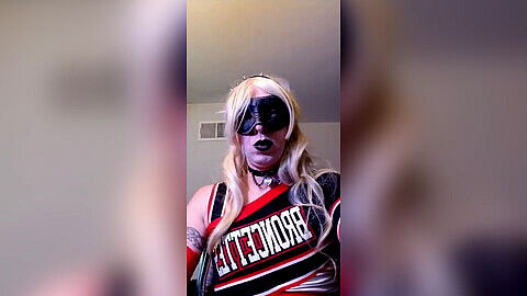 Punk cheerleader strikes again with a long teasing session for her goth crossdresser queer fans!