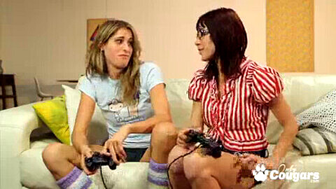 Busty gamers Kara Price and Sasha Sweet take a break from video games to enjoy some hot lesbian action