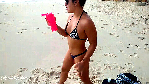 AprilBigass enjoys public beach fun, gulping over two liters of golden shower under the sun and summer heat!