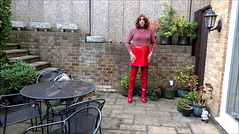 Alison enjoys wet and wild play in red PVC skirt and thigh-high boots