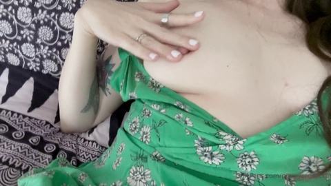 Extreme close-up video of natural mother's masturbation featuring big labia and nipples, fingering, moaning, and explosive contractions coupled with pulsing and throbbing orgasms. All shot up close while she rubs her sensitive clit through her summer dress.