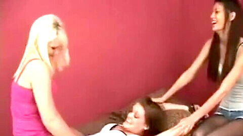 Candice Michelle gets strapped down and double-teamed with tickles on TickleCentral!