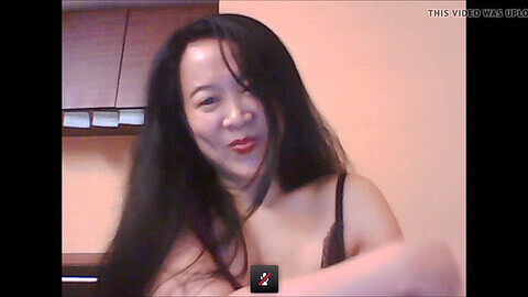 Lucy, the Asian slut, pleasures herself with me during our first cam session!