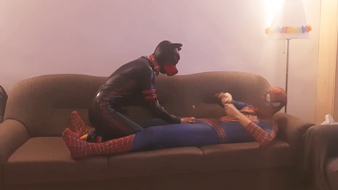 Spiderman satisfies Pup Pepper's rubber-clad cravings with a deep oral experience!