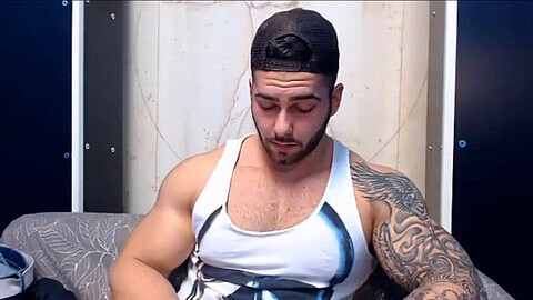 Beefcake webcam model shows off his muscles