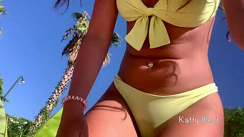 Kinky teen Katty West pisses in her panties at a public beach, then takes them off to sunbathe!