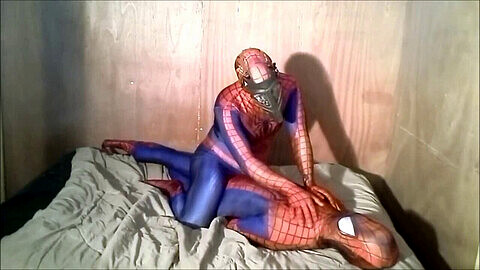 Spiderman dominates and sedates his fake rival in latex morphsuit