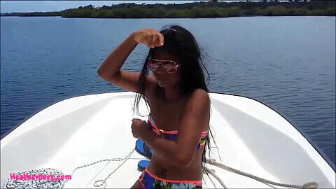 Thai nympho goes wild on a boat, taking a massive load down her deep throat